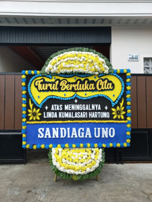 Papan Bunga Duka di Doyado