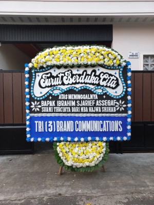 Papan Bunga Duka di Doyado